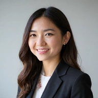 Retrato de una mujer profesional sonriendo.